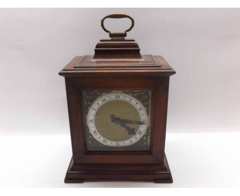 A second half of the 20th Century Mahogany Cased Timepiece, the plinth-shaped case with cushion moulded pediment and brass ca