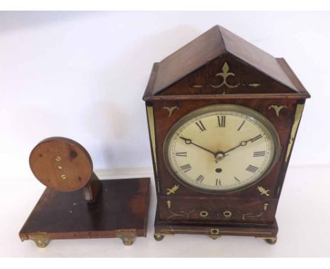 A composite Mahogany and Brass inlaid mantel Timepiece, the architectural case with arched pediment, side ring carry handles 