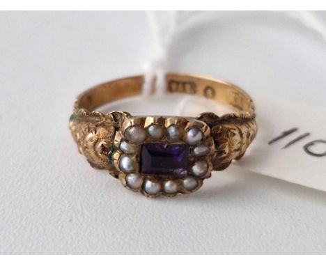 A antique amethyst pearl bordered ring 9ct size K