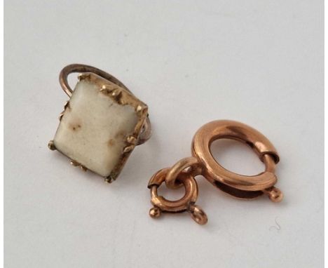 A Rose gold bolt ring and earrings top