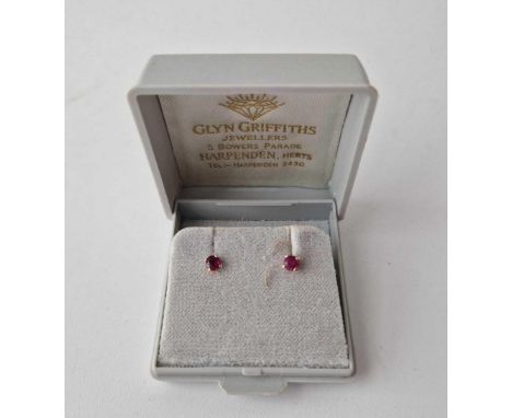 A pair of ruby ear studs 9ct