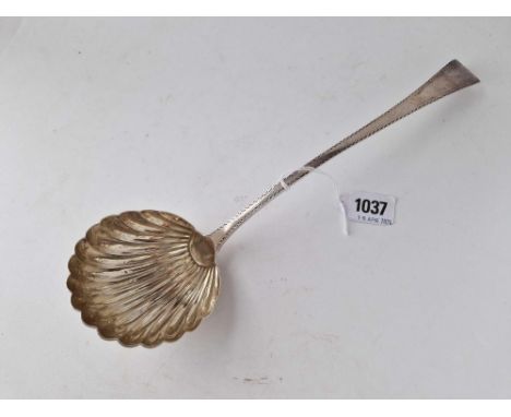 An early George III soup ladle with shell shaped bowl and wriggle work engraved border, London 1776, 168 g