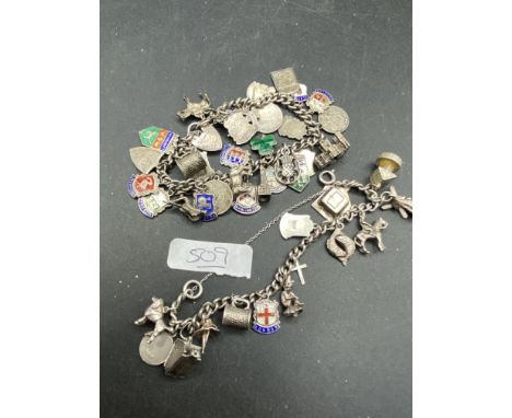 Two silver and enamel charm bracelets 103 gms