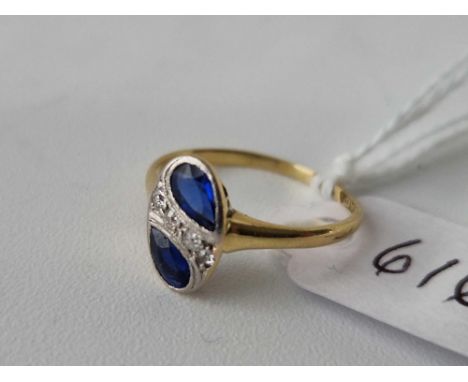 Antique Edwardian 18ct and platinum oval shaped ring set with 2 tear drop sapphires and a centre band of diamonds, size I, 1.