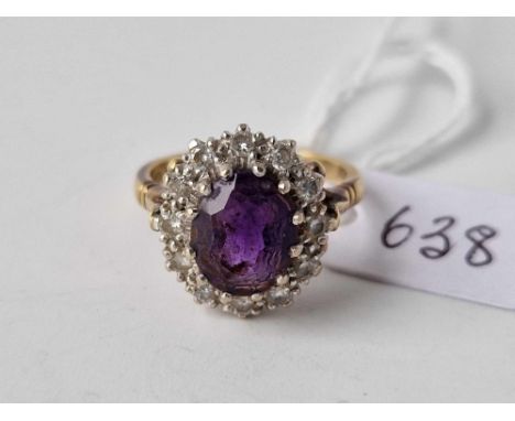 AN AMETHYST AND DIAMOND CLUSTER RING, 18ct, size N, 6.3 g