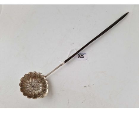 A 19th Century toddy ladle with fluted bowl, whale bone handle unmarked
