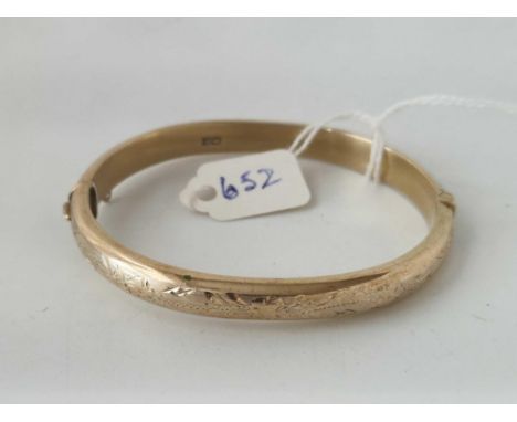 A silver gilt hinged bangle
