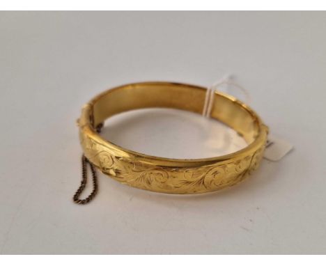 A rolled gold bangle