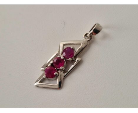 A white gold ruby pendant, 18ct