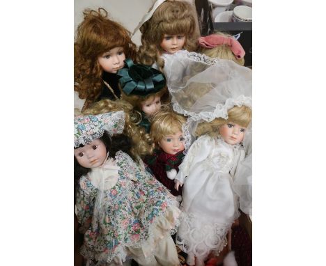 Collection of bisque head fashion and character dolls including a bride (9) 