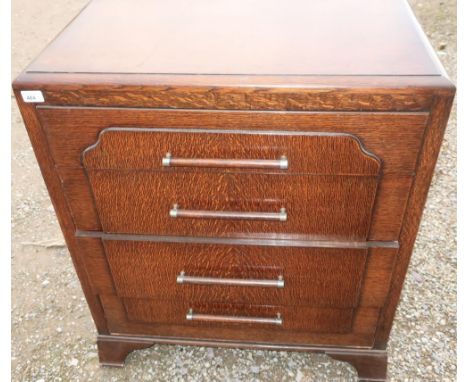 Beavan Art Deco oak chest of three drawers, on raised supports (76cm x 46cm x 88cm) 