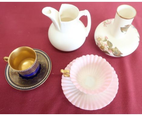 Royal Worcester cabinet cup &amp; saucer, decorated with gilt on a blue ground within a jewelled border, Graingers Worcester 