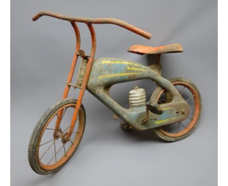 Child's red painted tubular framed bicycle in the form of a motor cycle with moulded metal petrol tank and engine and metal s