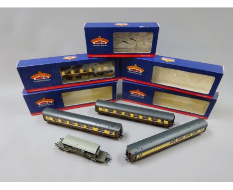 Four Bachmann 'OO' gauge Pullman umber and cream coaches: First Kitchen 'Falcon', Bar Second 'The Hadrian Bar' and two First 