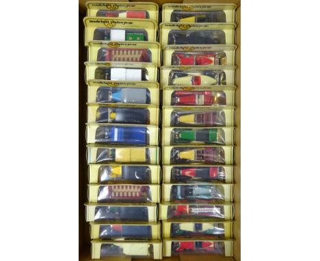 Twenty-six Matchbox Models of Yesteryear including promotional and vintage vehicles, all boxed