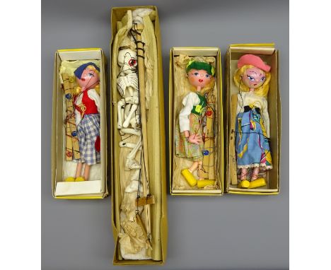 Pelham Puppet, large scale skeleton in brown box with paper label, and three other Pelham Puppets: Tyrolean Girl, Dutch Girl 
