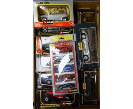 Collection of Burago 1/24 die-cast model cars including Freelander, Bugatti Atlantic, Jaguar XK 120, Mercedes SSK (2) etc, wi