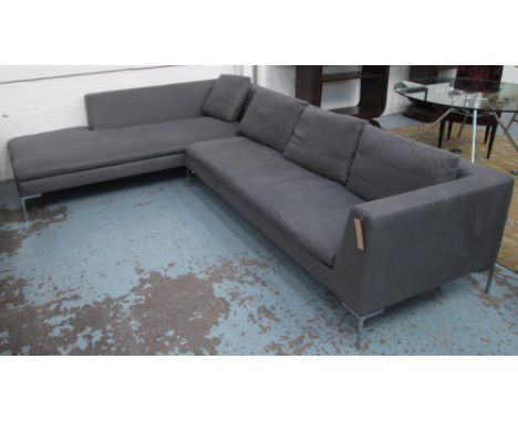 B&B ITALIA CORNER SOFA, in two sections, with grey upholstery, 327cm x 235cm. (with faults to the upholstery)