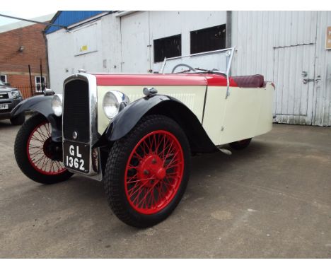 A 1934 BSA TW34-10 Special Sports, registration number GL 1362, red over cream. This VMCC eligible three wheeler has been res