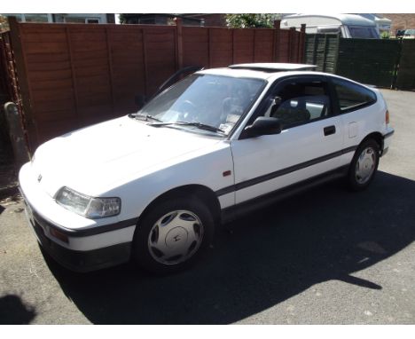 A 1988 Honda Civic CRX 1.6, registration number F380 URU, white. With 62,000 miles from new, this early CRX Honda coupé has b