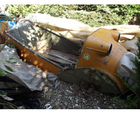 A 1959 Messerschmitt KR200 restoration project, yellow. This KR200 has been dismantled in readiness for restoration. It would