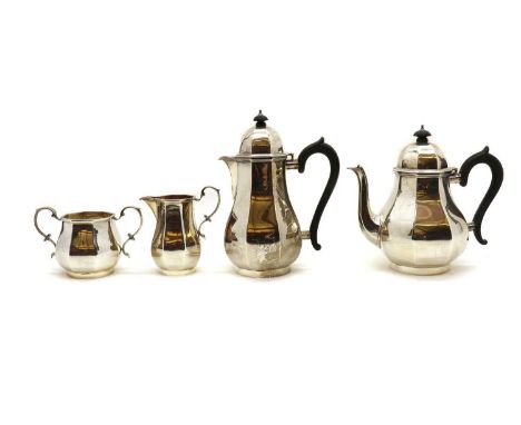 A four piece silver tea service,by Elkington &amp; Co, Birmingham 1935, of bulbous octagonal form, comprising a hot water pot