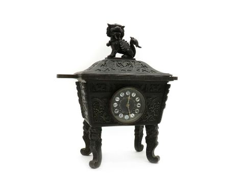 A spelter Chinese style mantel clockearly 20th century, in the form of a Chinese censer, the two train movement striking on a