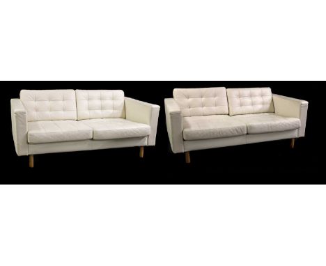 A pair of Ikea 'Landskrona' two-seater settees,each with white button back 162cm wide 88cm deep63cm high, seat 40cm (2)Buying