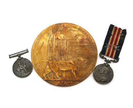 A bronze WWI death penny,12cm diametertogether with a WWI medal pair,named to 18147 A. W. O Cl. 2, later SJT. F. W. Todd 137 