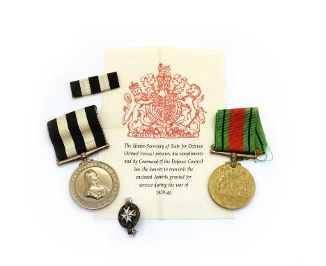 A Service Medal of the Order of St John,with its ribbon and clasp,together with a WWII Defense Medal,awarded to Mr R. Robson,