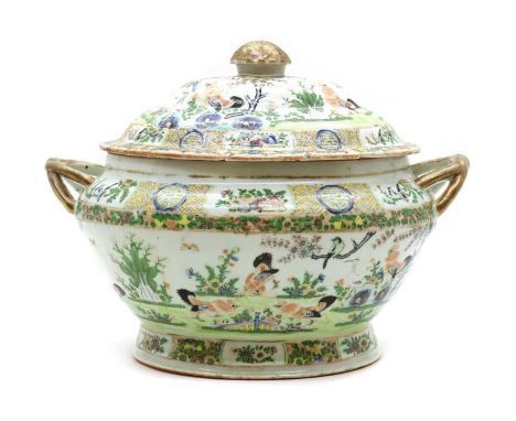 A Chinese famille rose tureen and cover,early 20th century, of oval form, decorated with cockerels and various birds in a gar