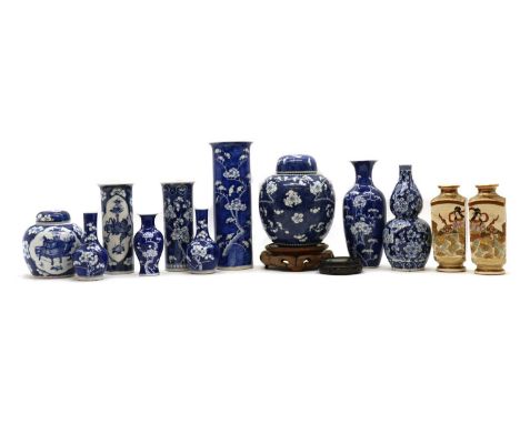 A collection of Chinese blue and white,late 19th-early 20th century, comprising:eight vases and two jars with covers, decorat