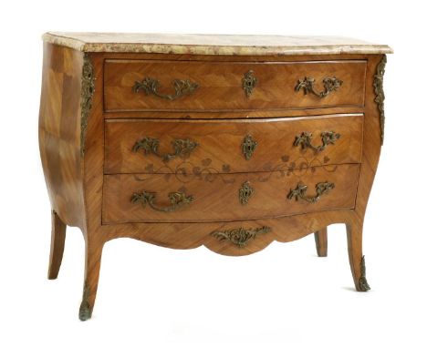 A Louis XV-style rosewood and tulipwood and marquetry commode, first half of the 20th century, French, of serpentine outline,