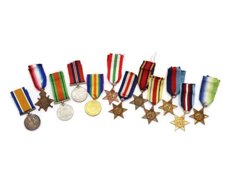 A group of nine WWII medals,comprising the 1939-1946 Star, Atlantic Star, Arctic Star, Africa Star, Burma Star, Italy Star, F