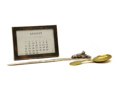 A Tiffany silver desk calendar,marked 925, with month cards,11.5cm widetogether with a silver letter opener,by Elkington, She