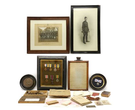 A collection of framed WWI and WWII medals,comprising; a WWI trio, named to LIEUT S. J. Gowlett, to include a 1914-15 Star, B