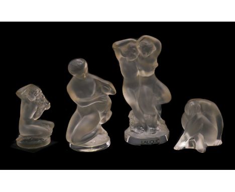 A group of Lalique glass figures,of recent manufacture, comprising 'Le Faune', 14cm high, 'Floreal', on a black glass base, 8