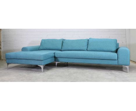 An L-shaped sofa,of recent manufacture, with teal upholstery on polished metal supports,the larger section;182cm wide89cm dee