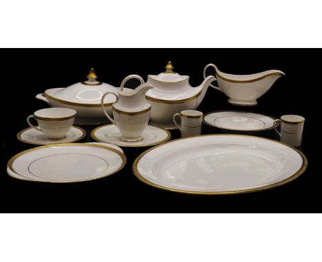 A Royal Doulton porcelain 'Royal Gold' pattern dinner service,for twelve settings comprising two lidded tureens, 32cm wide, a