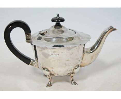 A hallmarked silver teapot, length 22cm, gross wt. 13oz.