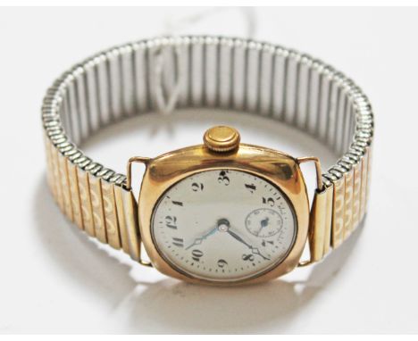 A gent's hallmarked 9ct gold vintage wristwatch with plated strap.