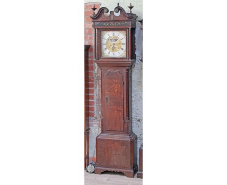 A Georgian oak long case clock, 8 day movement with rolling moon, brass and steel dial inscribed 'Coates Wigan', height 220cm