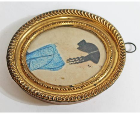A Victorian miniature profile portrait in gilt frame, length 12cm.