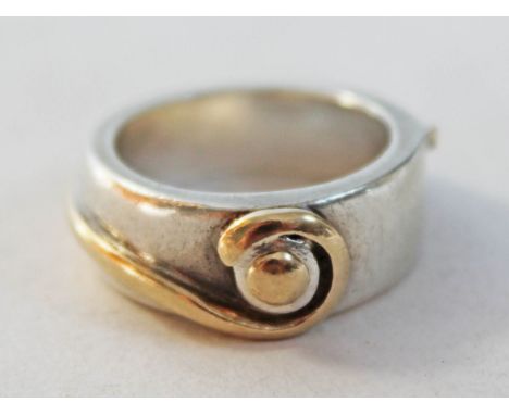 A contemporary hallmarked silver Arts & Crafts style ring, size K.