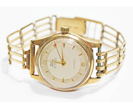A gent's vintage hallmarked 9ct gold Elco wristwatch with hallmarked 9ct gold strap, diam. 3cm, gross wt. 37.5g.Condition: Th