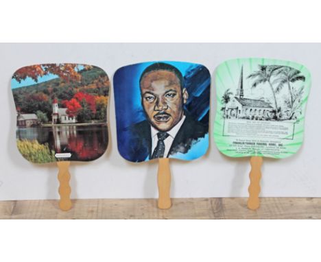 A group of three American vintage funeral fans.
