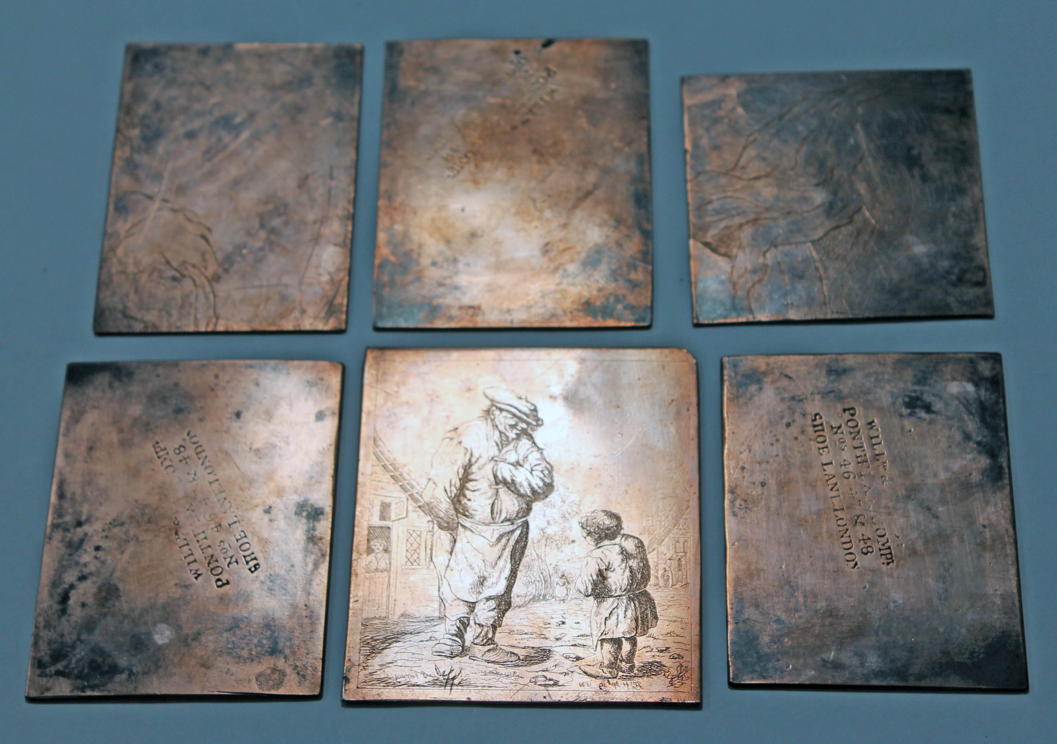 A group of six Victorian brass printing plates, largest 7.5cm x 9cm.