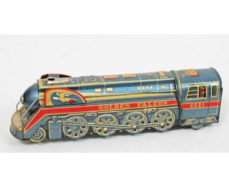 A Japanese vintage tin plate electric locomotive 'Golden Falcon'.