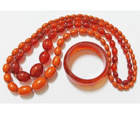 Two vintage bakelite bead necklaces and bangle.