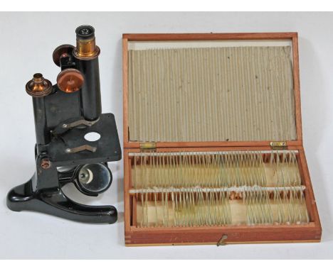 A Beck model 22 microscope with case of slides most of which labelled 'K Mattinson, Austwick Lancaster'.